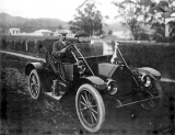 Mr and Mrs W. Medhurst, Queen St, Paeroa in 1912. Studebaker Roadster.